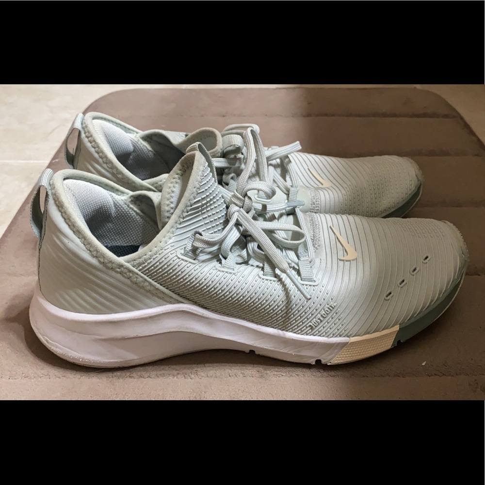 Light blue Nike athletic shoes